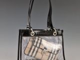 burber bag in black and white with a checkered pattern