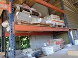 a lot of boxes on the shelves in the warehouse