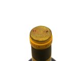 a bottle of wine that is sitting on a table