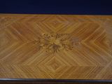 a wooden box with a design on the inside of it