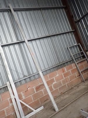 a man riding a skateboard on a ramp in a building