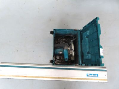 a blue and white box with a drill on top of it