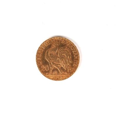 une petite pièce sur laquelle figure l'effigie d'un homme