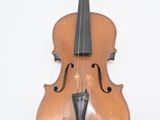 an old violin on a white background with a bow on the back
