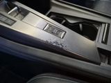 a close up of a car ' s center console