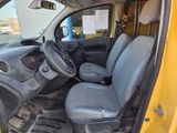 a yellow truck with a black seat and a steering wheel