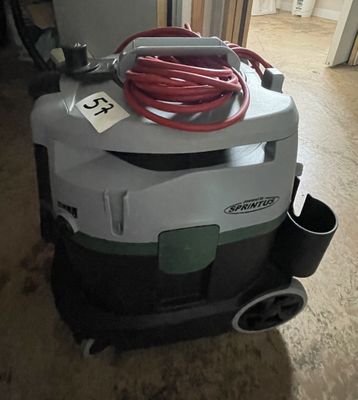 a vacuum cleaner that is sitting on the floor