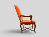 an orange upholstered chair against a gray background