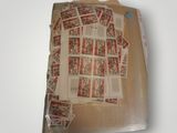a lot of stamps on a piece of paper