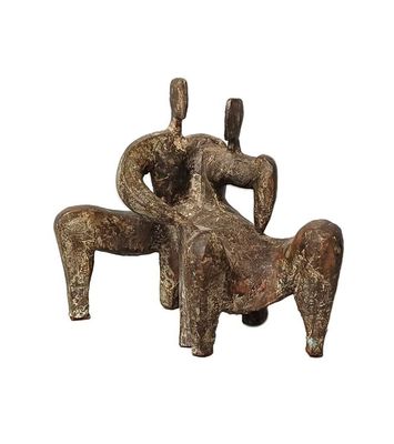 an image of a sculpture of two people sitting on a chair