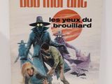 la couverture d'un livre sur laquelle figure l'image d'un homme coiffé d'un chapeau et d'une femme allongée par terre