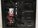 a black computer case with wires and wires attached to it