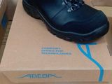 a box with a pair of shoes on top of it