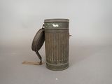 a metal trash can with a handle on it