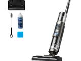 an image of a cordless vacuum cleaner with cleaning supplies