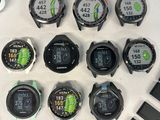 a lot of watches that are sitting on a table