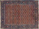 an antique persian rug with a red and blue border