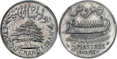 a close up of a coin with a picture of a boat on it