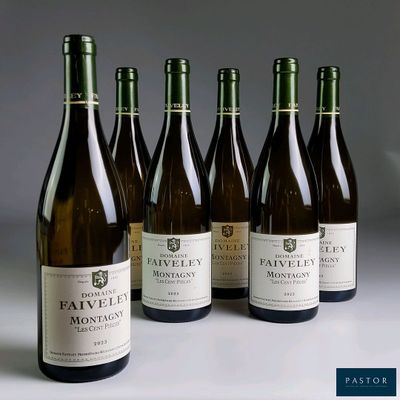 six bottles of wine are lined up on a table