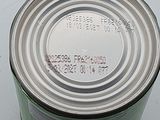 a tin of food that is sitting on a table