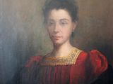 portrait of a woman in a red dress with a black shawl