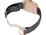 a close up of a wrist watch with a black strap