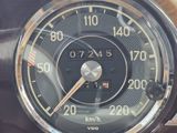 a close up of a speedometer on a car