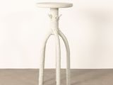 a white table with a rope wrapped base and a wooden top