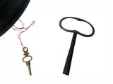 an image of a hat and a key on a white background