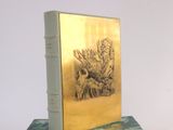 a book that is sitting on top of a book stand