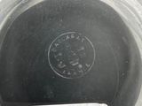 a close up of a metal container with a label on it