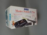 a box that has a picture of a master system in it