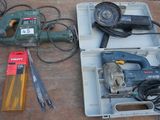 a box with tools on a table next to a tool box