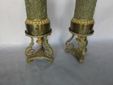 pair of antique brass candlesticks with green glass vases on stands