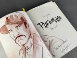 a drawing of a man with a hat and mustache in a book
