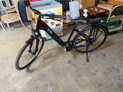 a bicycle that is parked in a garage