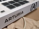 a white box that has a black and white logo on it