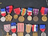 many medals and medals on display on a table