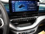 a picture of a car dashboard with a display on it