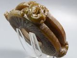 a close up of a hot dog on a glass plate