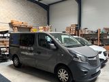 the van is parked in the garage of the warehouse