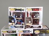 batman pop vinyl figures are stacked on top of each other