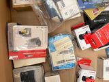 a box full of electronic equipment that is sitting on the floor