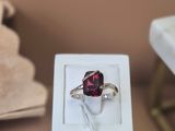 a ring that is sitting on top of a white box