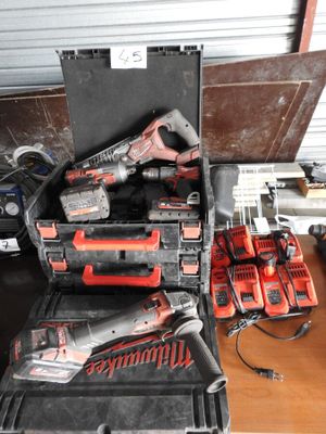 a lot of tools that are sitting on a table