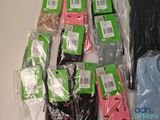many pairs of socks that are wrapped in plastic