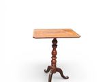 a small table with a wooden top on a white background