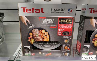 deux boîtes de grills Tefal exposées dans un magasin