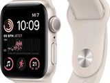 an image of a white apple watch with a white band