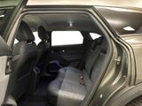 a view of the inside of a car from the driver ' s seat